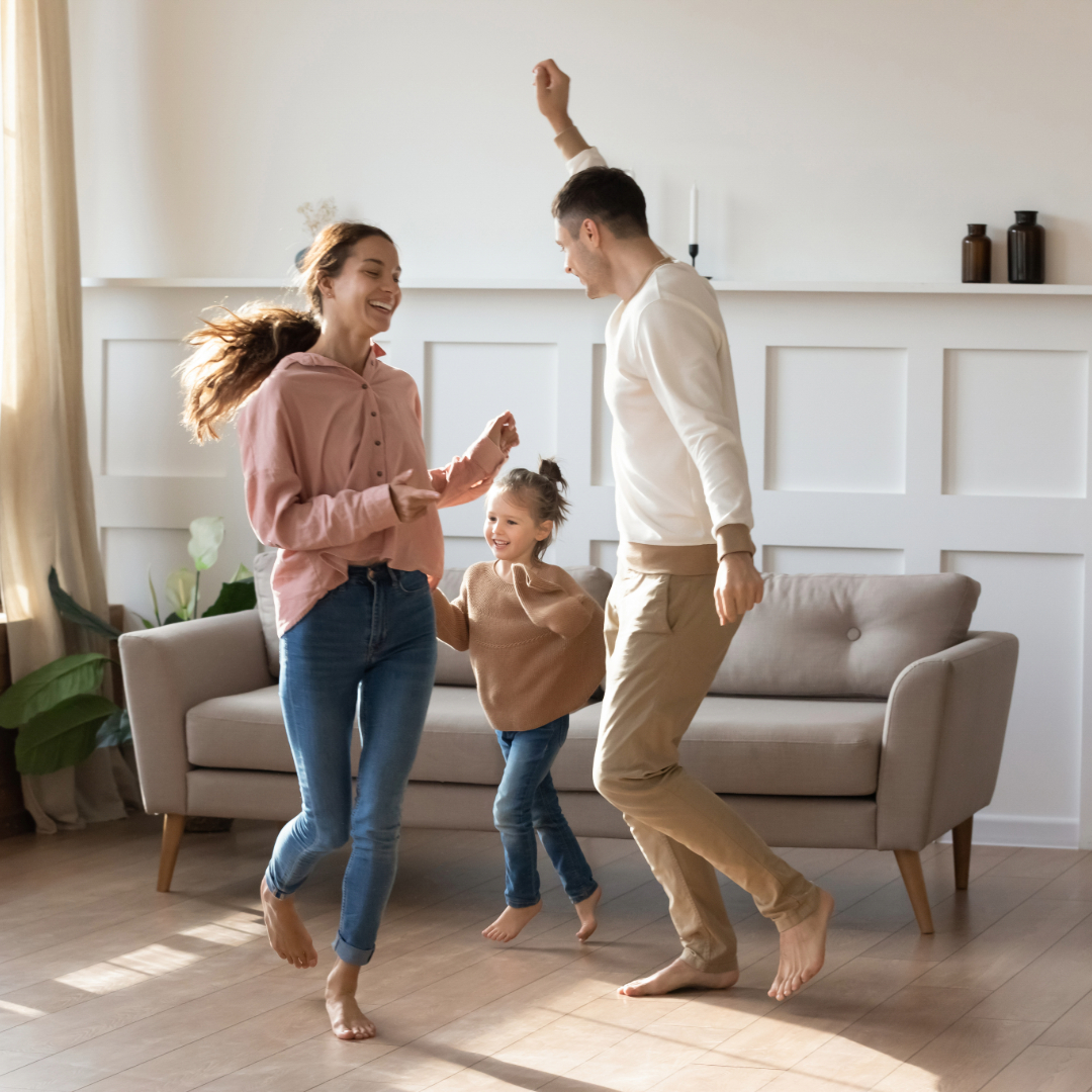Radiant-Flooring Family enjoying a heated floor from a radiant heating solution.