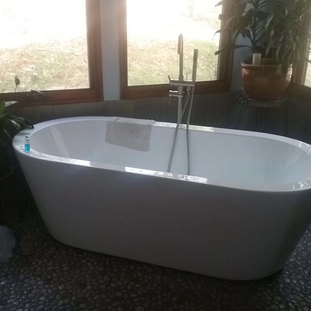 Residential plumbing solutions, where a new tub installation took place during a bathroom remodel.